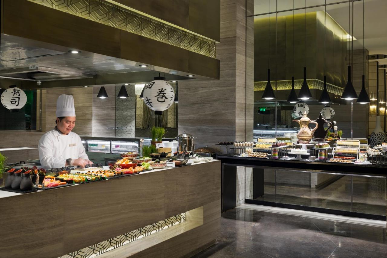 Fairmont Riadh Exterior foto The buffet at the hotel
