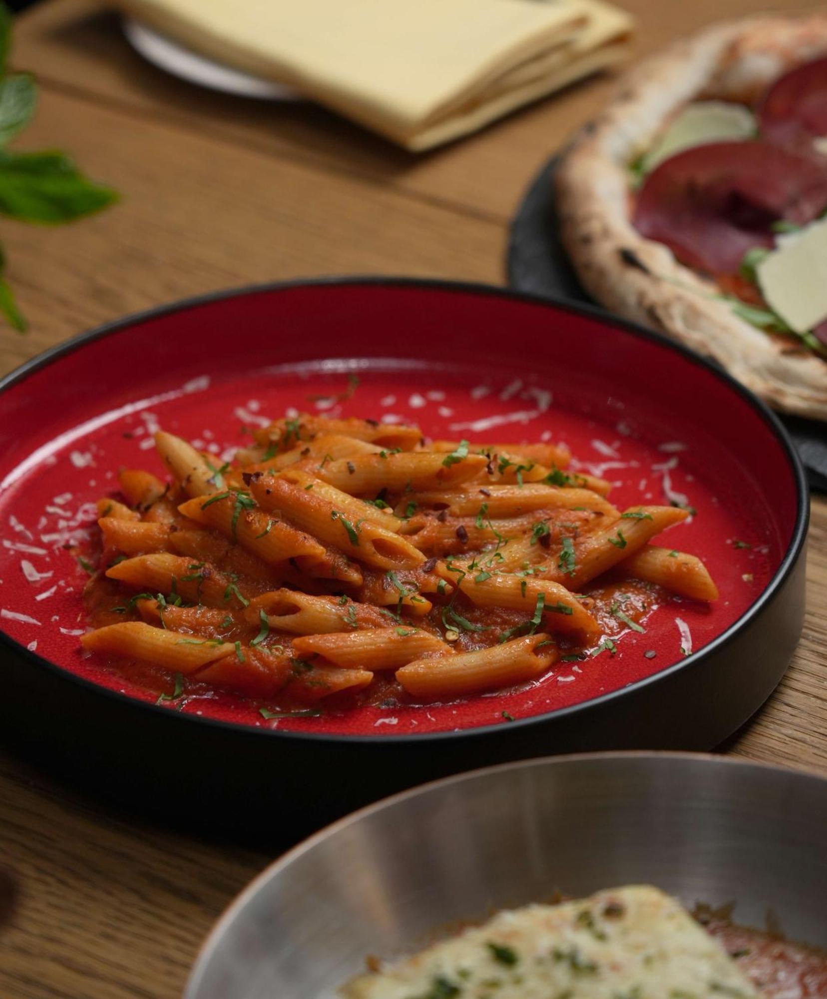 Fairmont Riadh Exterior foto Pasta with tomato sauce
