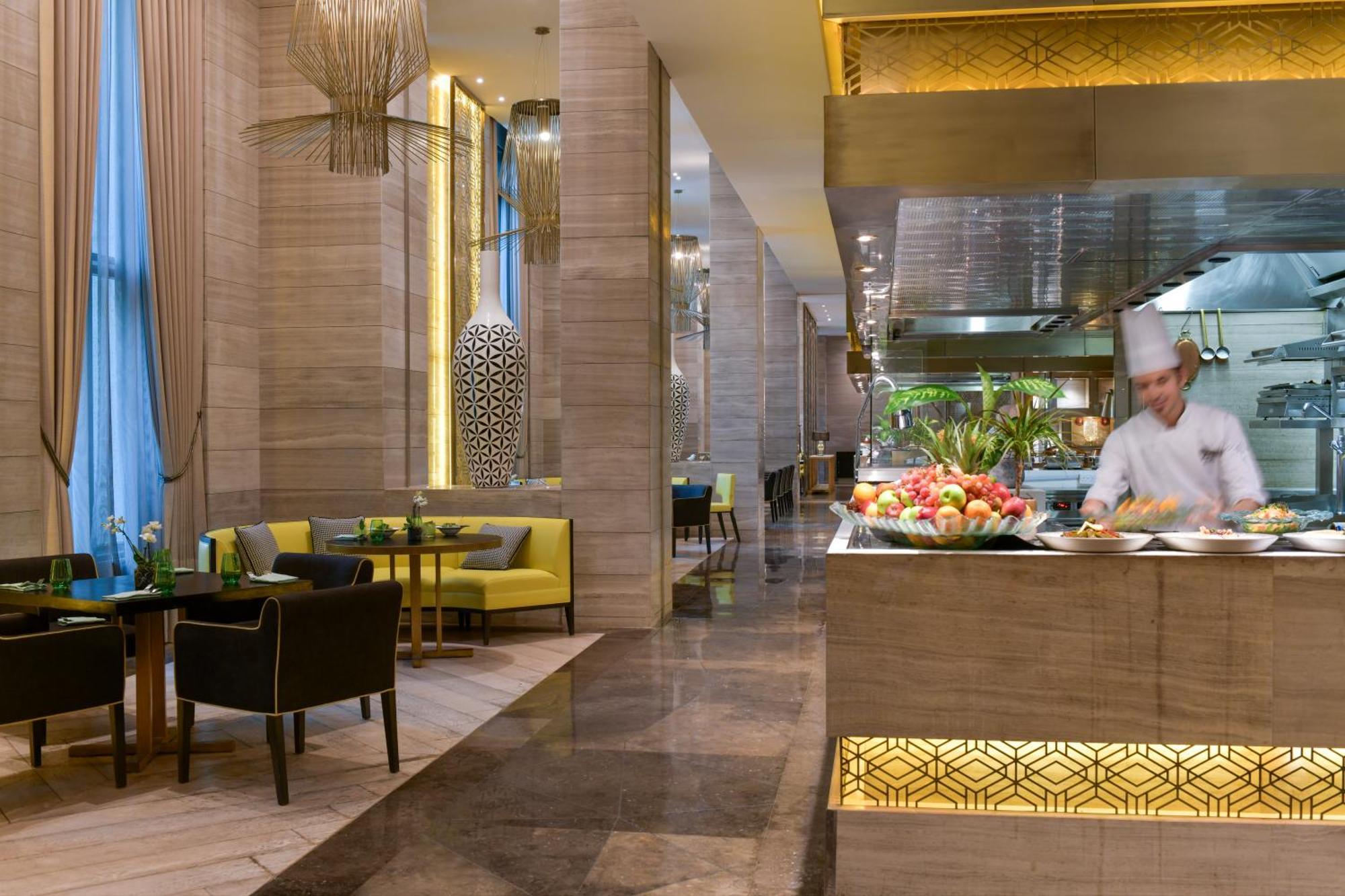Fairmont Riadh Exterior foto The restaurant