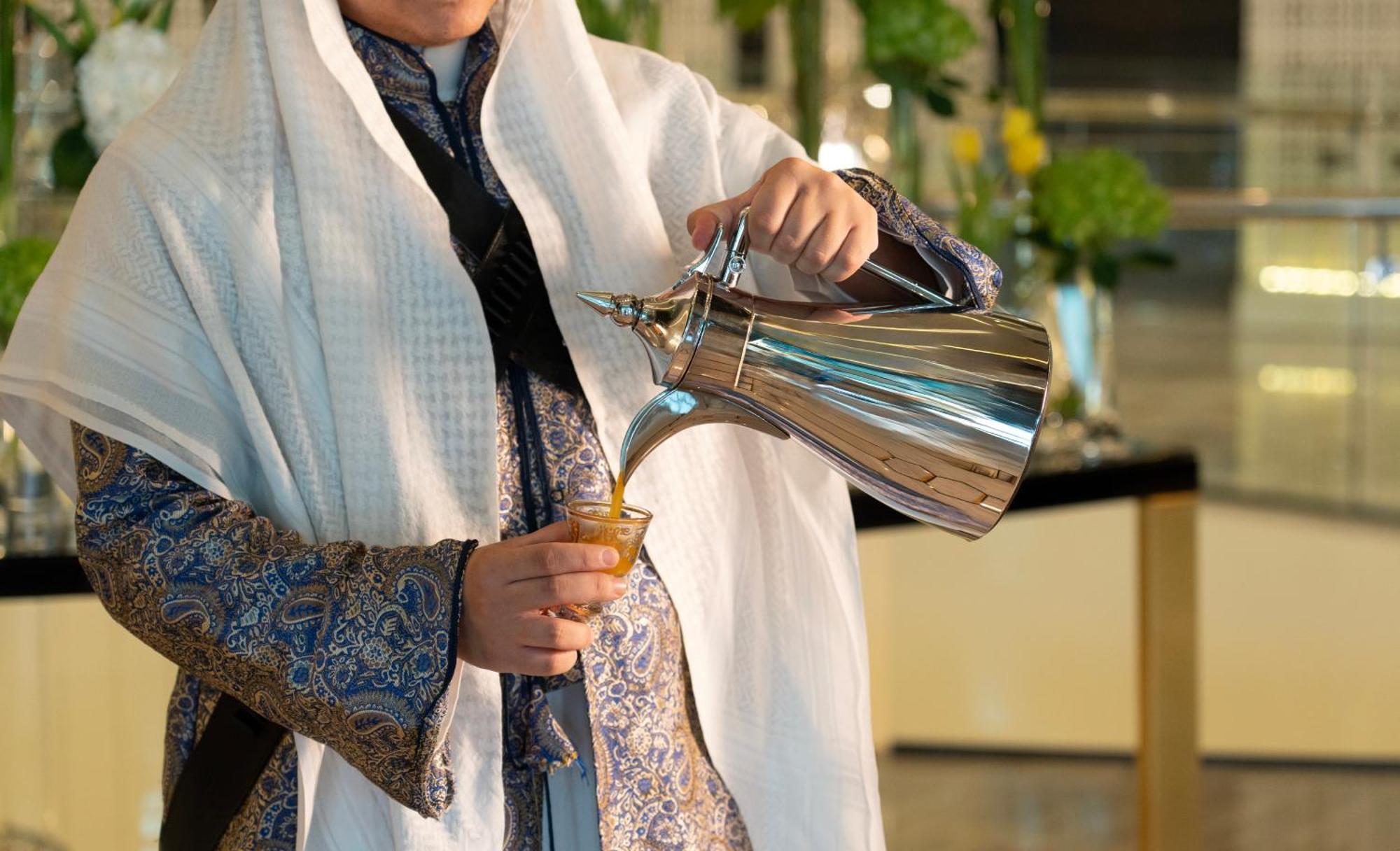 Fairmont Riadh Exterior foto Arabic coffee being served